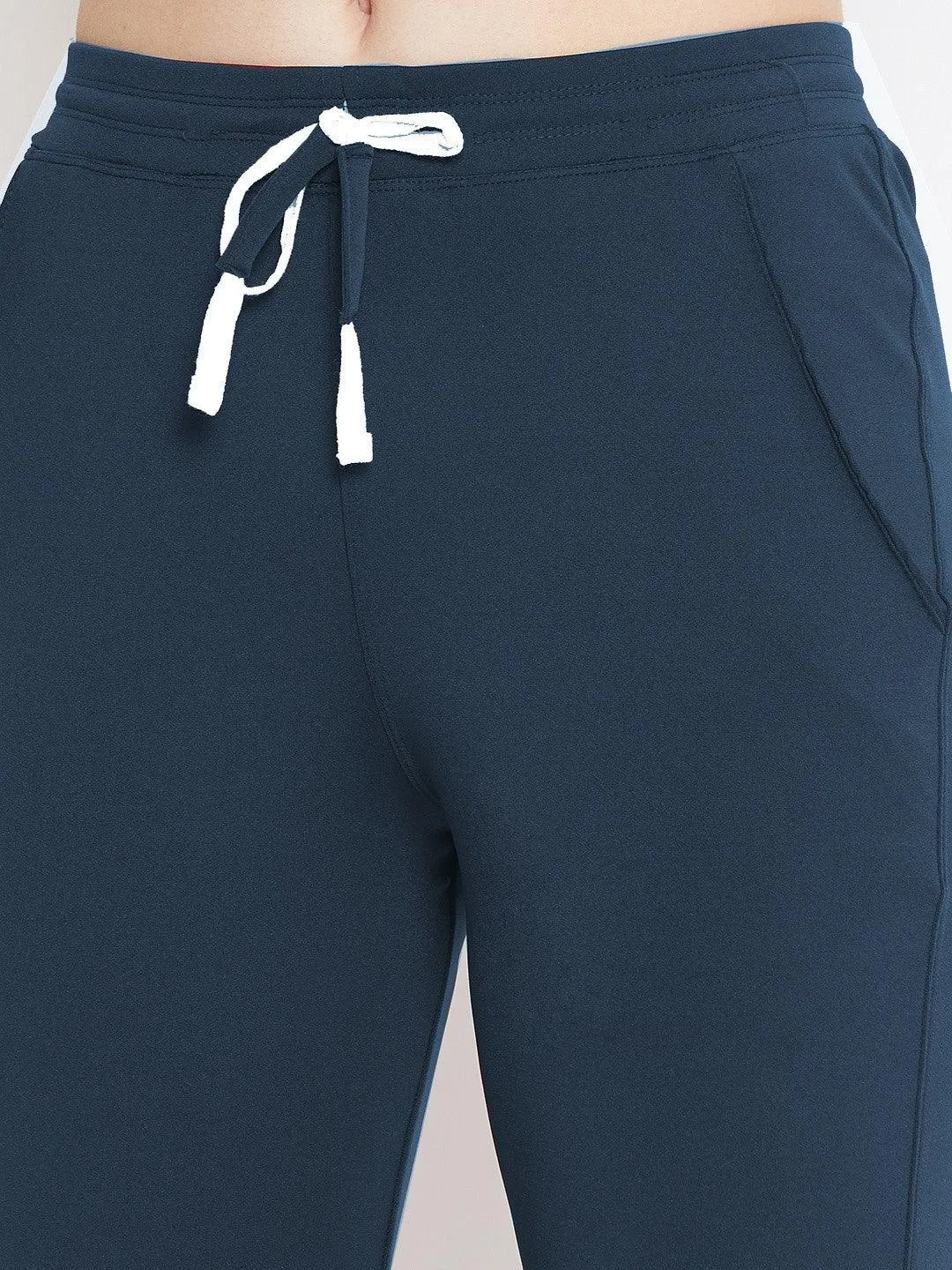 Women Solid Dark Blue Track Pants
